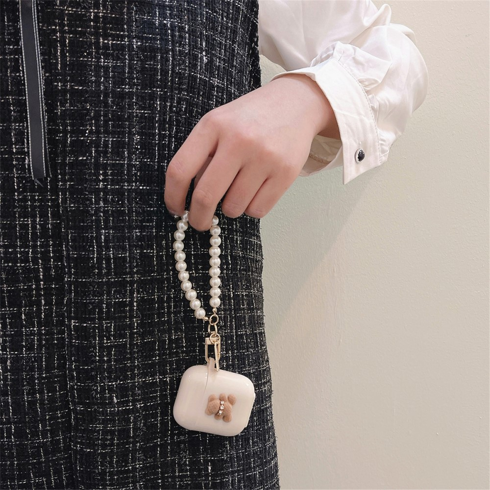 AirPods (1. & 2. Generation) Gummi Case Schutzhülle mit Handschlaufe Bär mit Krone Design - Beige