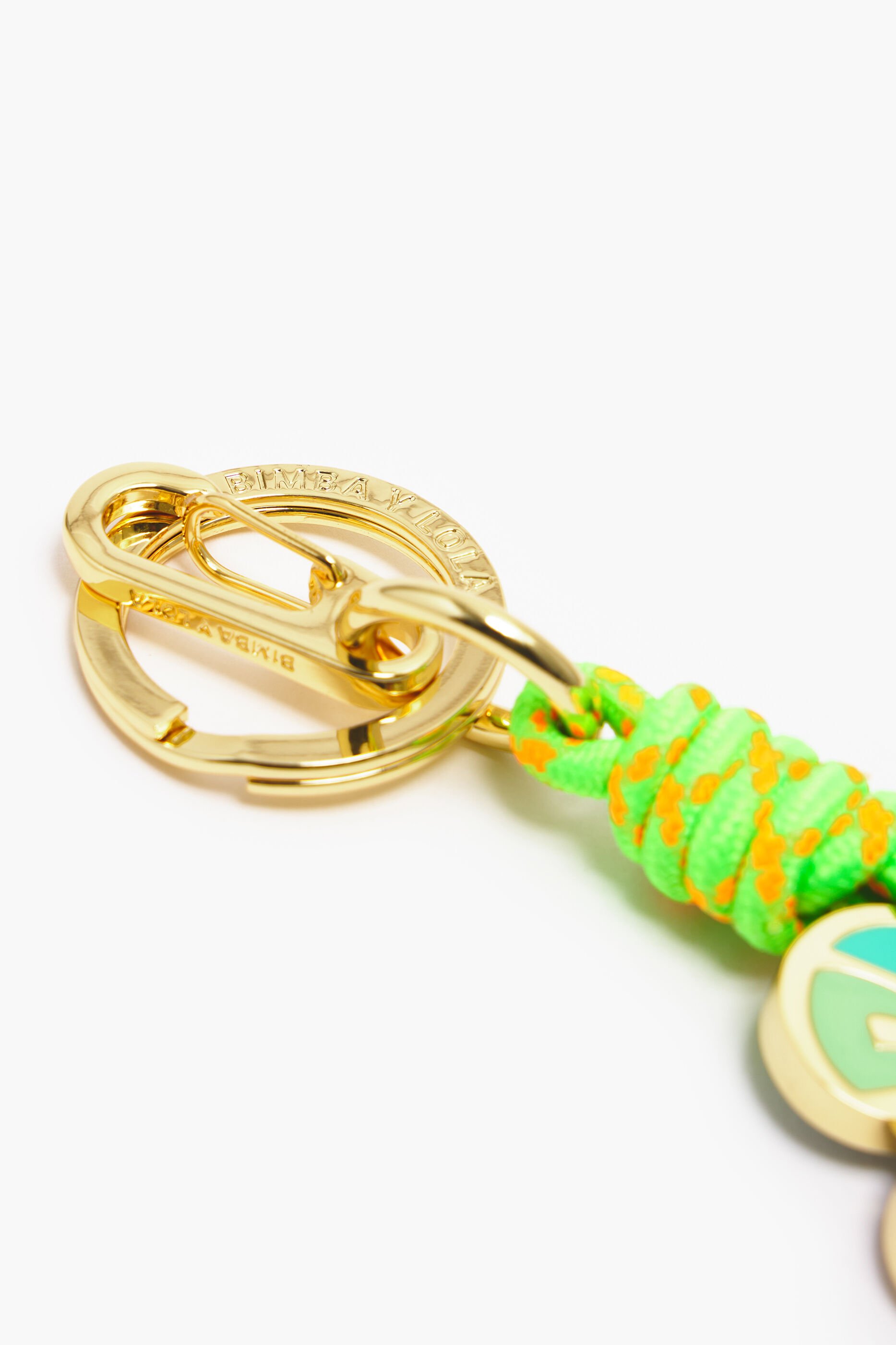 Chaveiro de flor dourada