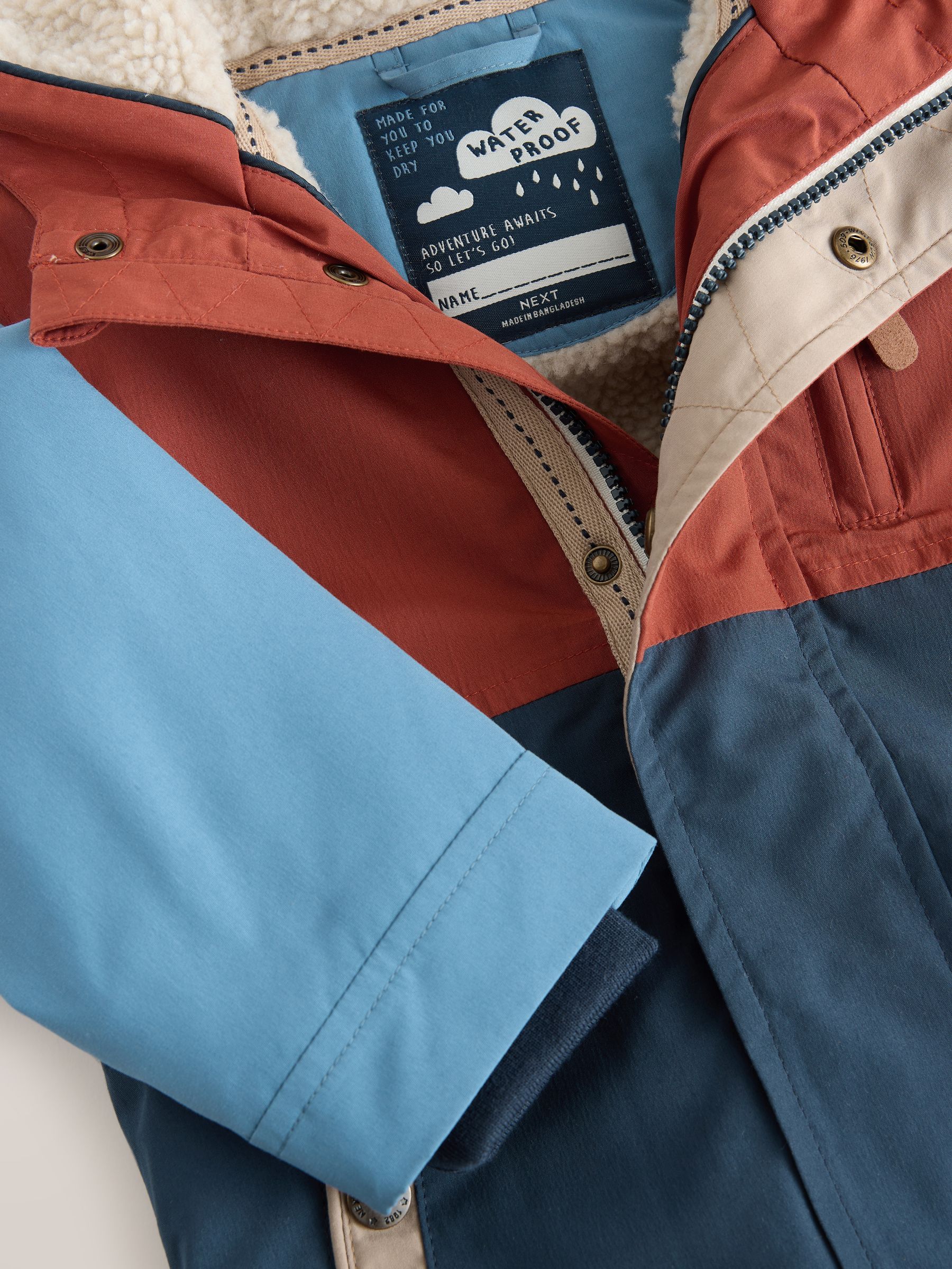 Marineblauw/rood met kleurvlakken - Waterdichte parka met borgvoering (3mnd -7jr)