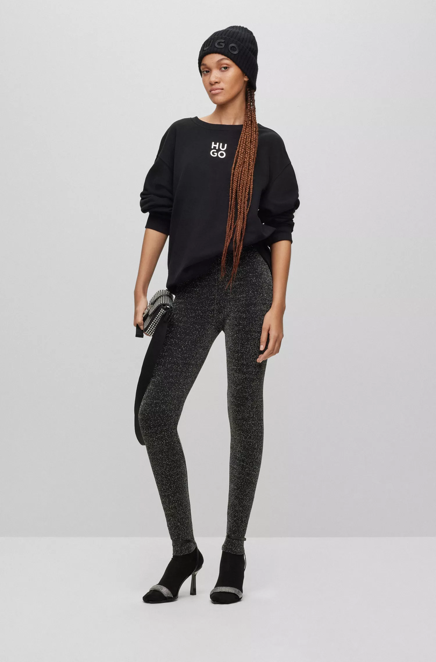 Leggings HUGO com efeito glitter vermelho e cós com logo.