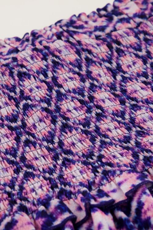 Blauw rokje met roze print en smock