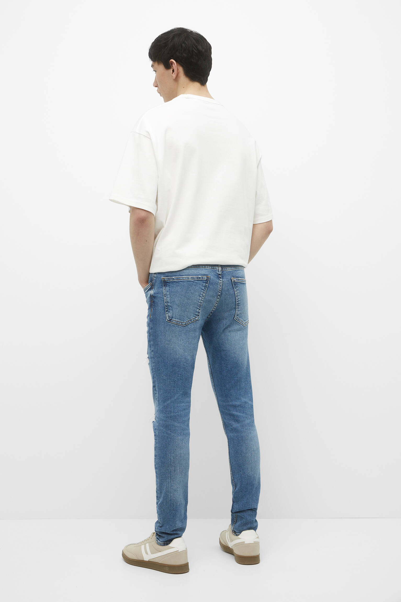CALÇA JEANS SKINNY RASGADA - AZUL MÉDIO
