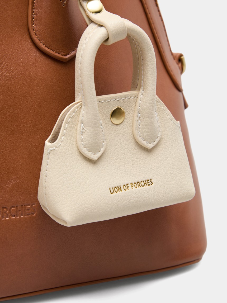 Porta-chaves charm em forma de mini mala