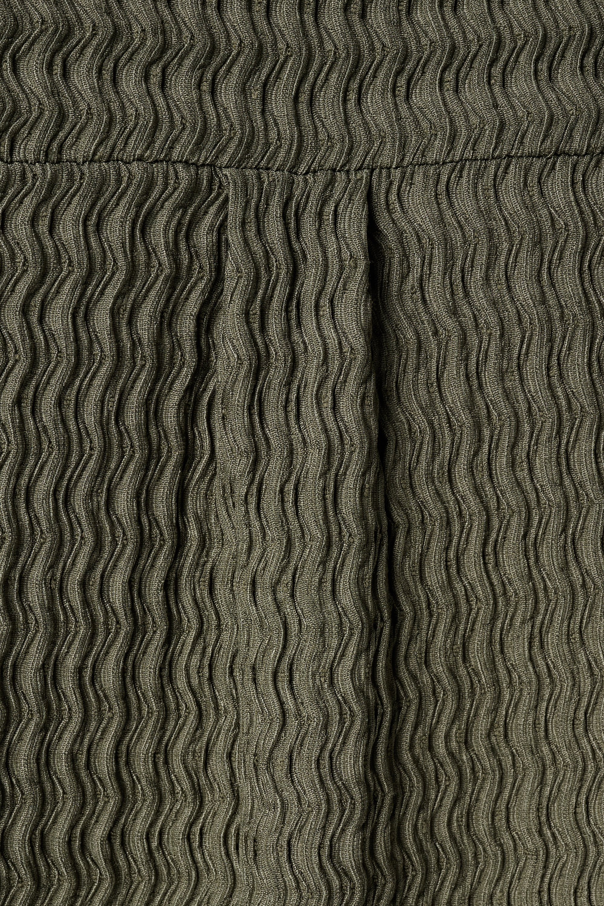 Top met structuur stof Khaki