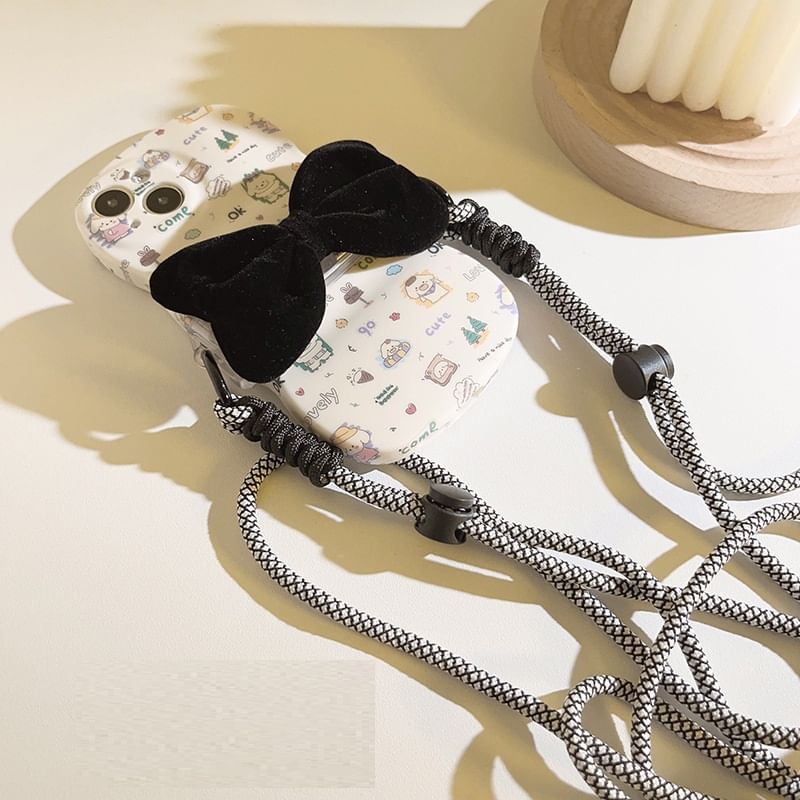 Karnemelk - Pluche strik clip op telefoonkoord