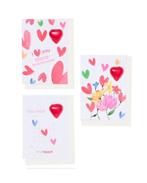 carte de voeux avec coeur en chocolat et mélange de fleurs