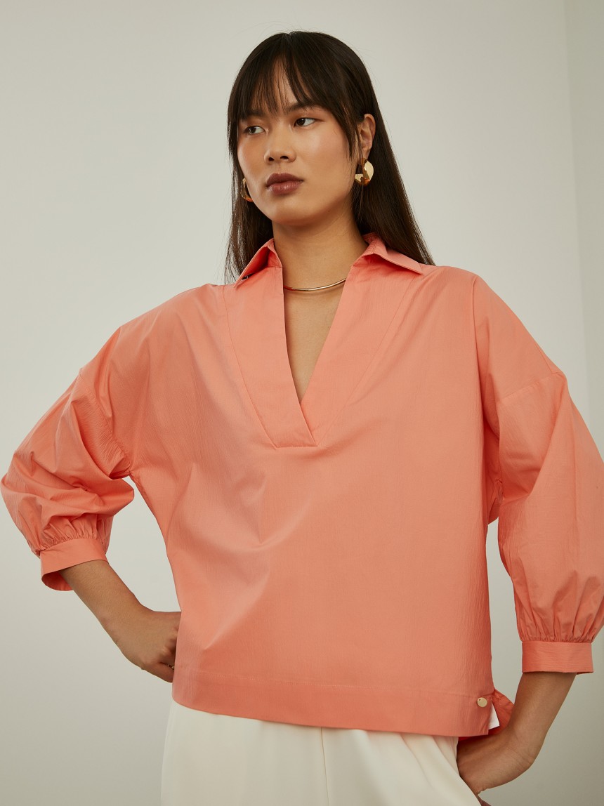 Camisa mangas abalonadas com decote em V