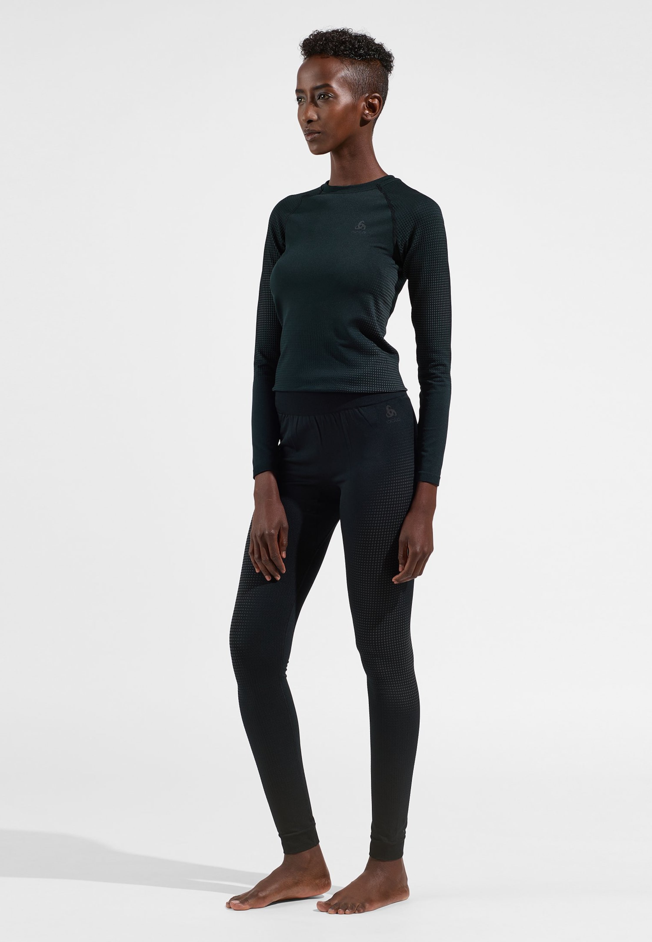 Performance Warm Base Layer Tights in black - odlo graphite grey