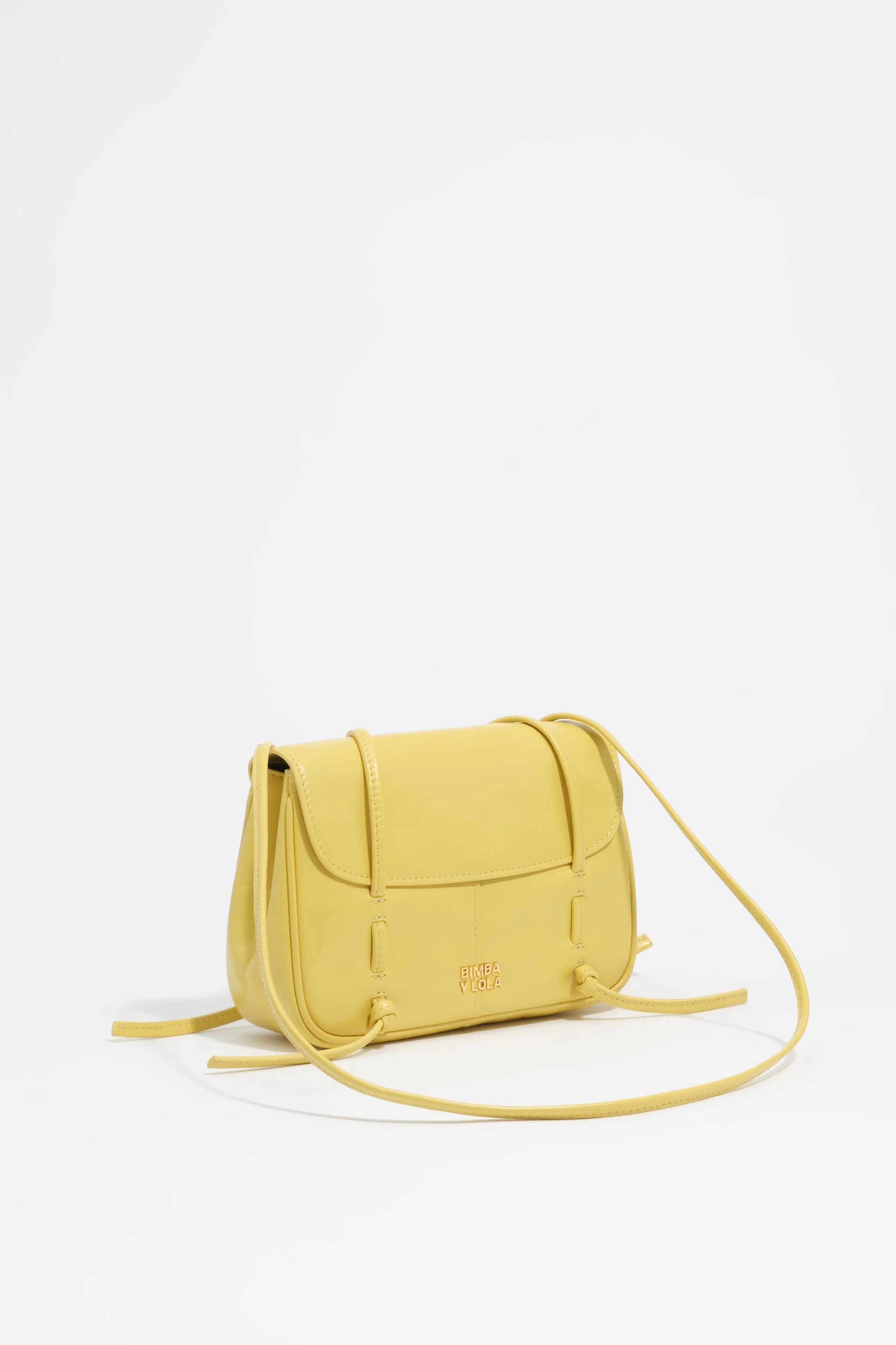 Bolsa mini flap de couro amarelo