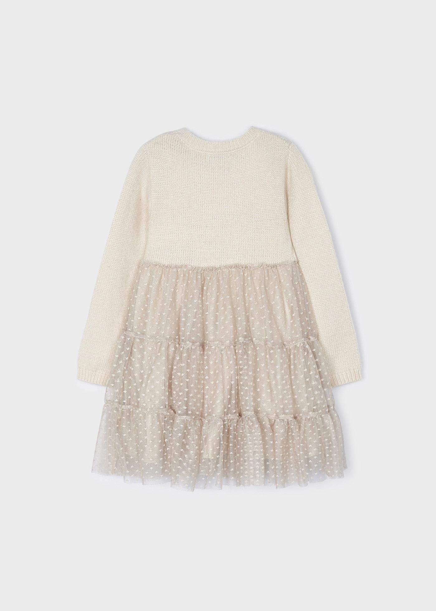 Vestido infantil combinando malha e tule.