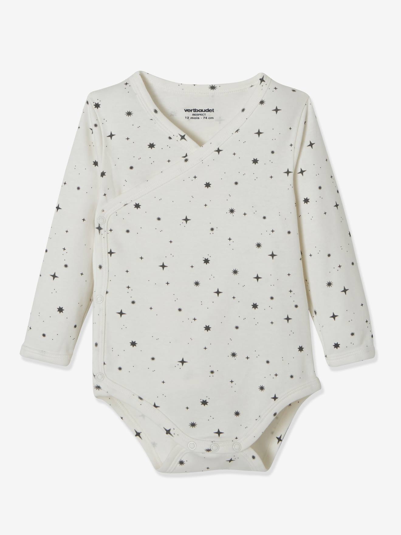 Conjunto Lovely Nature com 3 bodies de manga comprida em algodão orgânico para recém-nascidos, nas cores branco claro e bicolor/multicolorido.