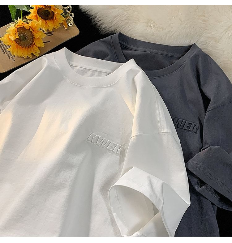 FOEV - T-shirt met ronde hals en elleboogmouwen en belettering