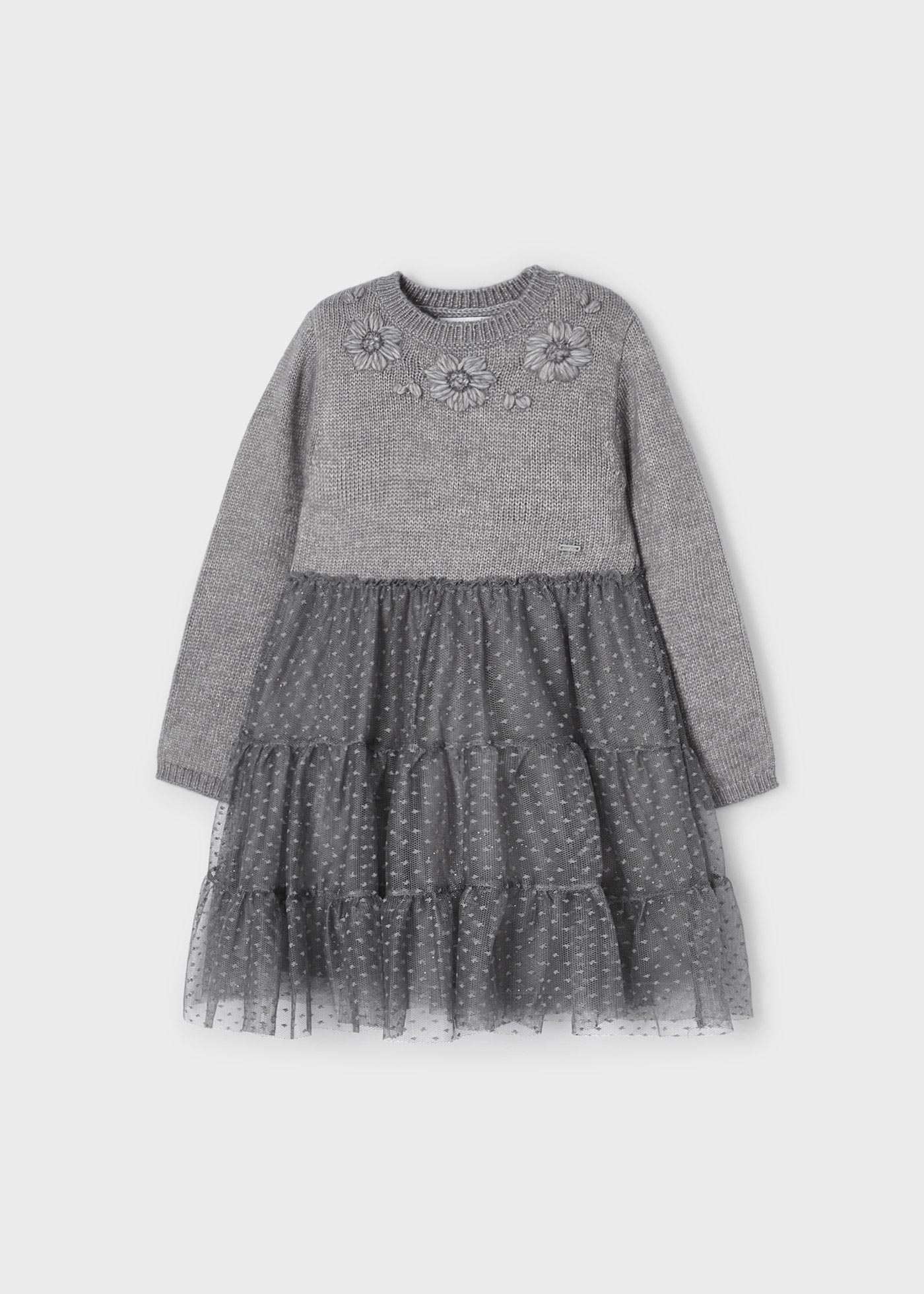 Vestido infantil combinando malha e tule.