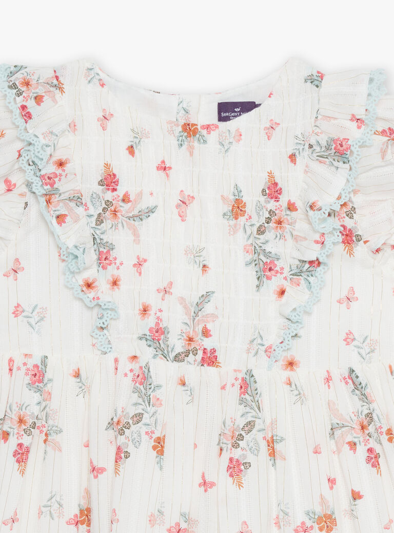 Robe écrue à volants et fleurs
