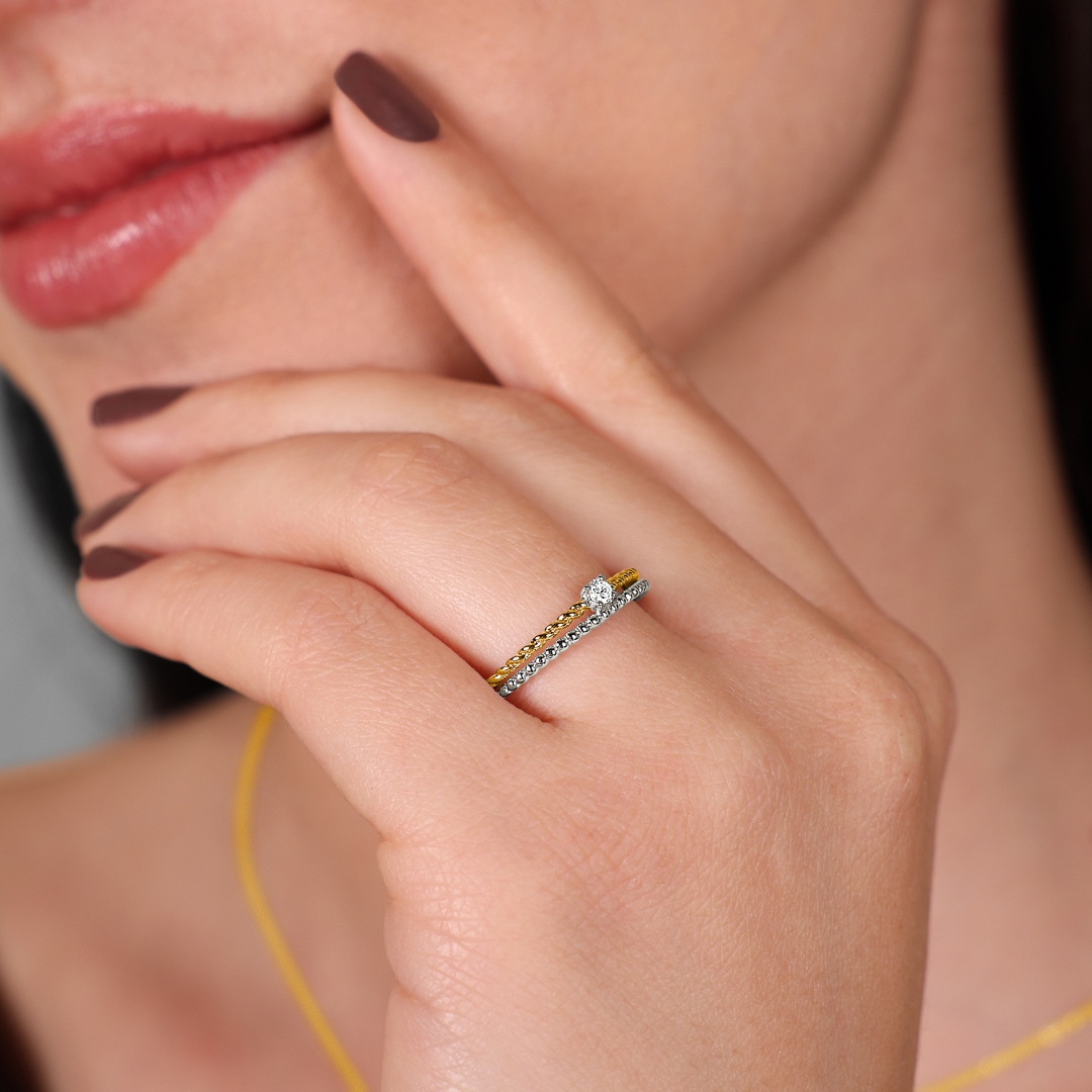 Ring 750/18 K Gelb-/ Weissgold mit Diamanten 0.06 ct H/si