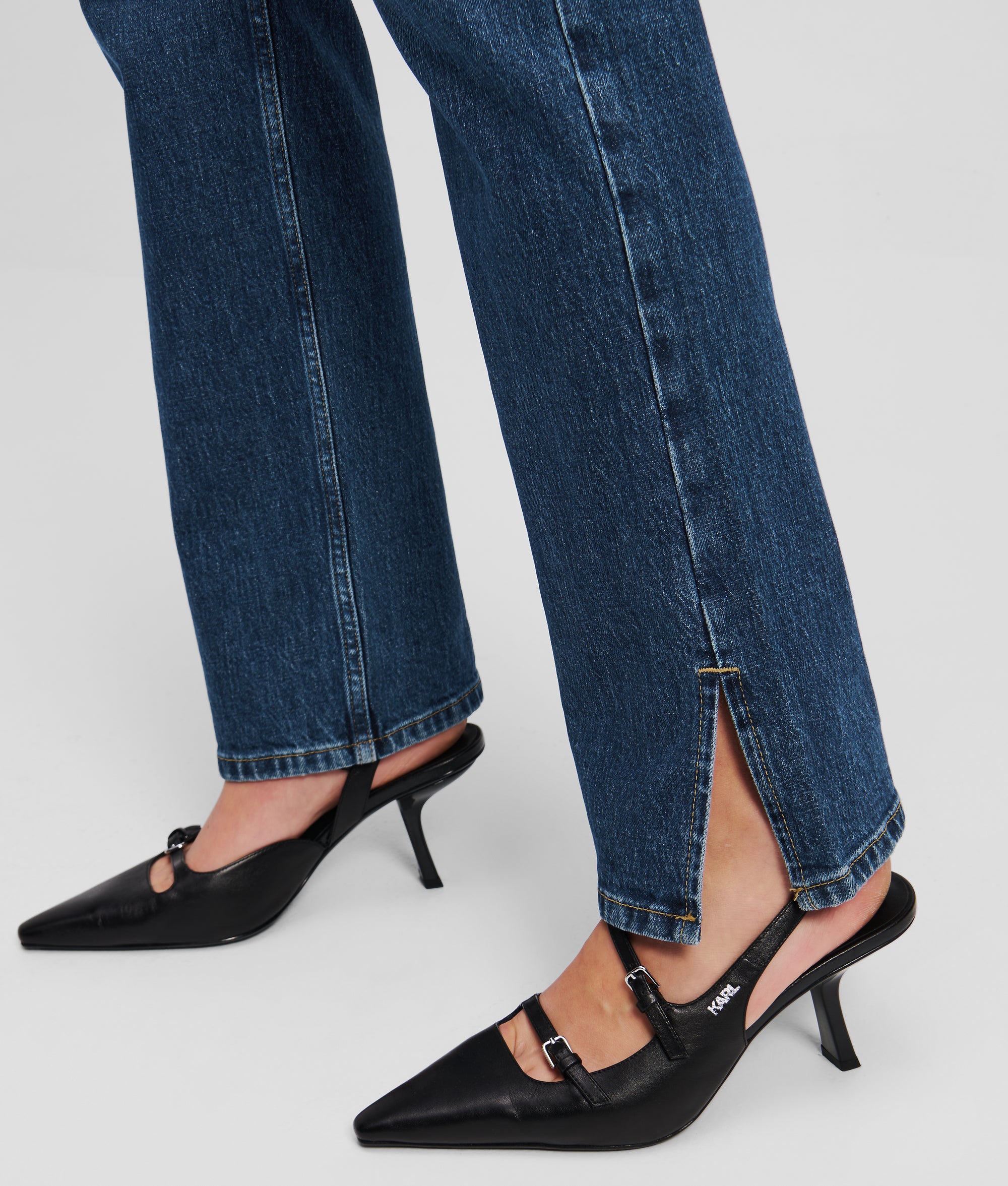 High-rise straight jeans met split-zoom