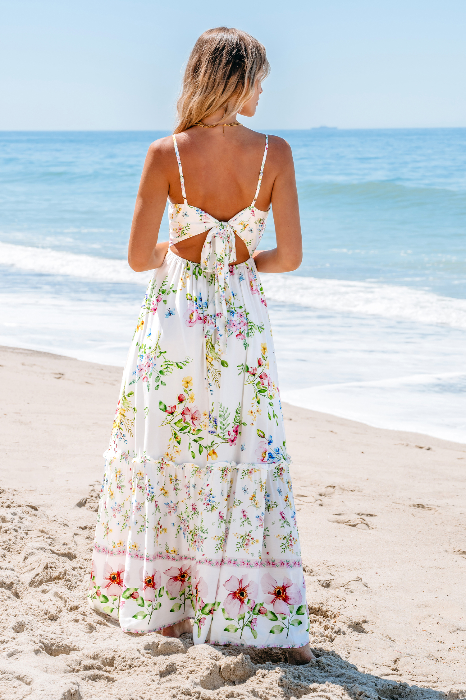 Robe maxi découpée et torsadée à imprimé floral