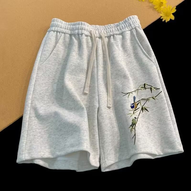Cowpow - Zweetshorts met trekkoord en geborduurde vogels
