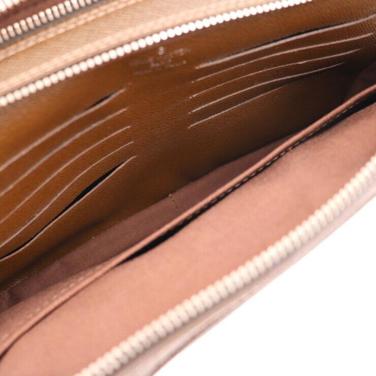 Louis Vuitton Vintage Louis Vuitton Clutch Brown