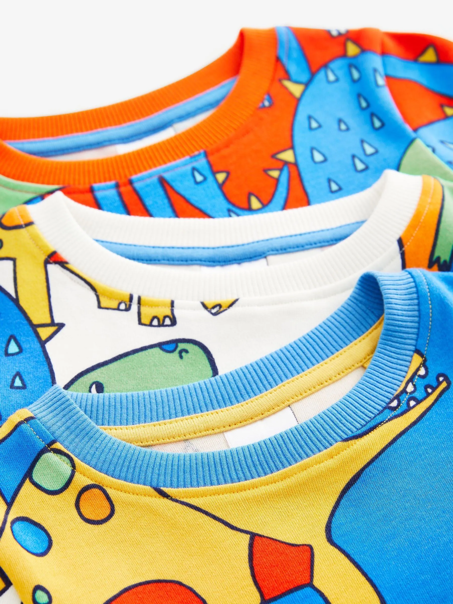 Felkleurig met dinosaurusprint - Verpakking van 3 knusse pyjama's (9 mnd-10 jr)