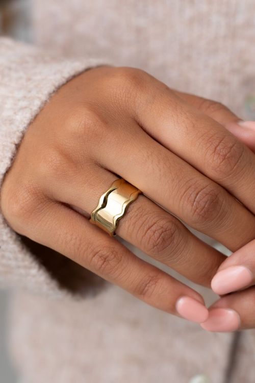 Statement ring met wave en structuur