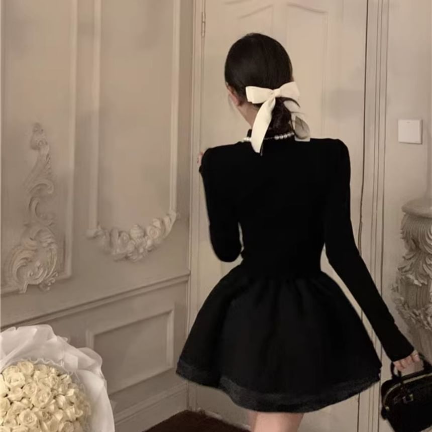 ZY·HT - Mini A-lijn jurk met lange mouwen en een mockneck