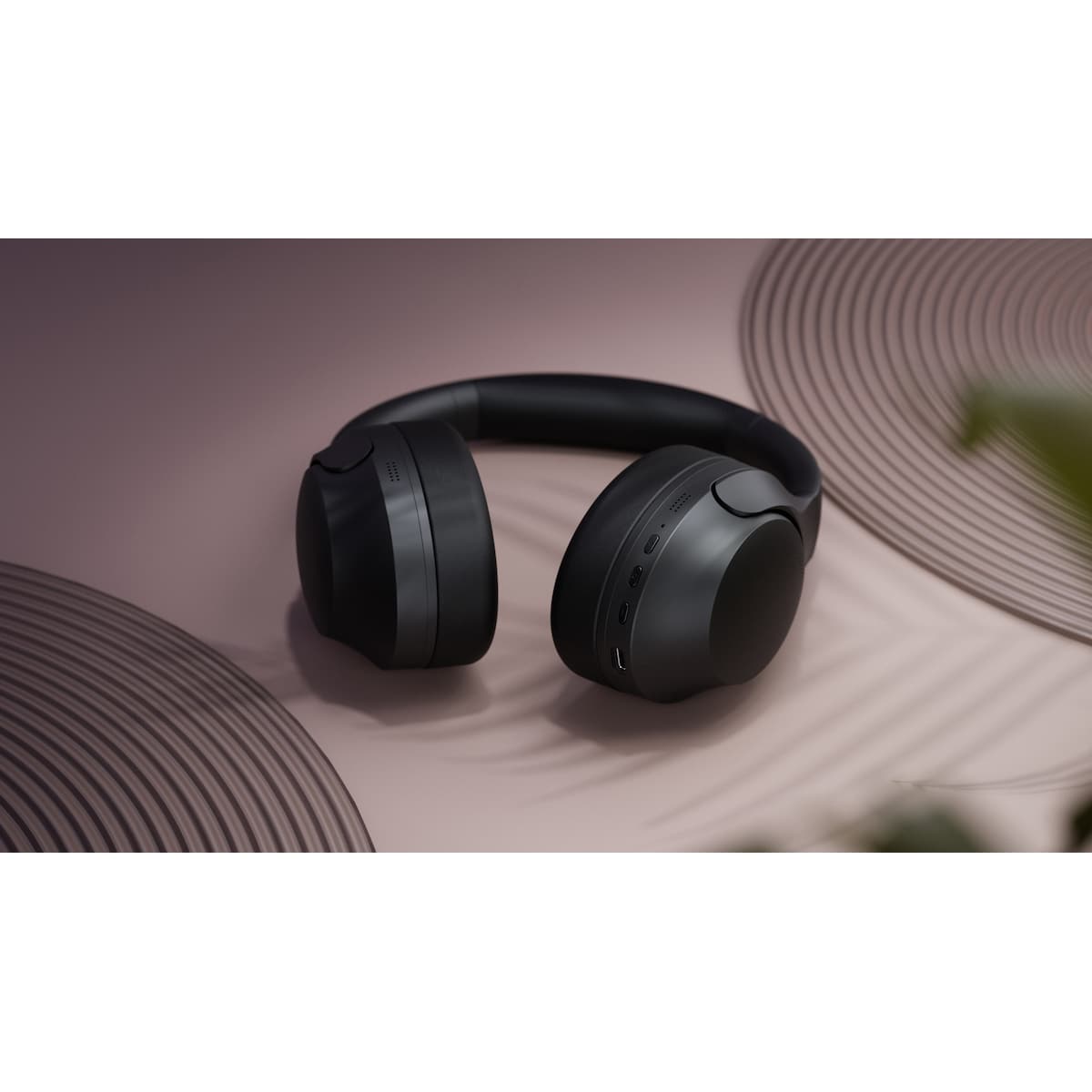 Happy Plugs Play Pro helt trådløse around-ear hodetelefoner (sort)