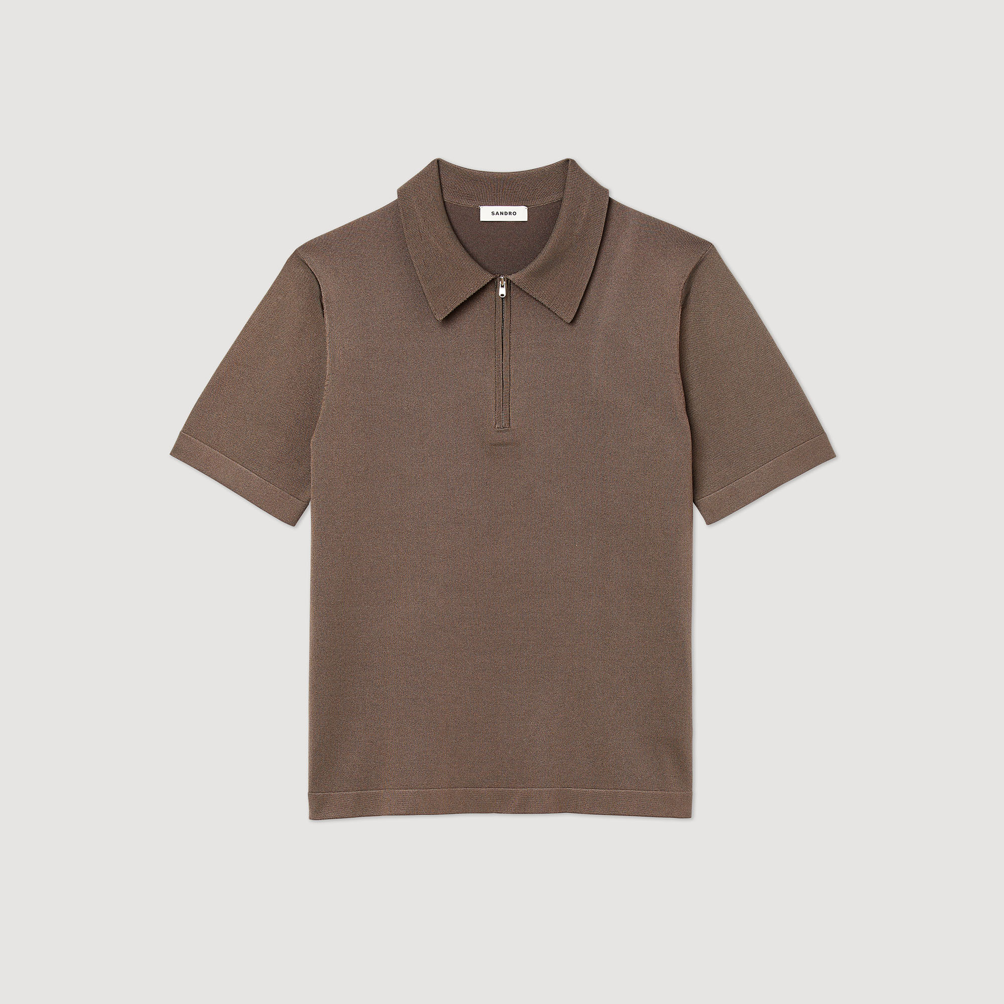 Polo en maille á col zippe