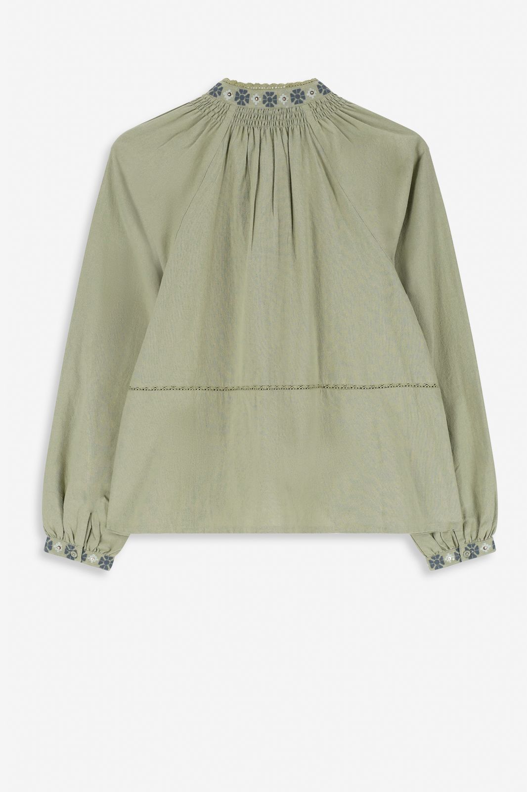 Lichtgroene blouse met borduurwerk