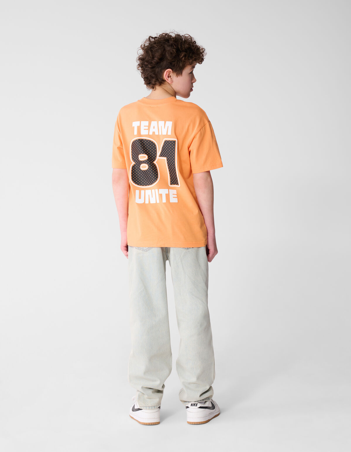 Team Unite Artwork T-shirt Oranje