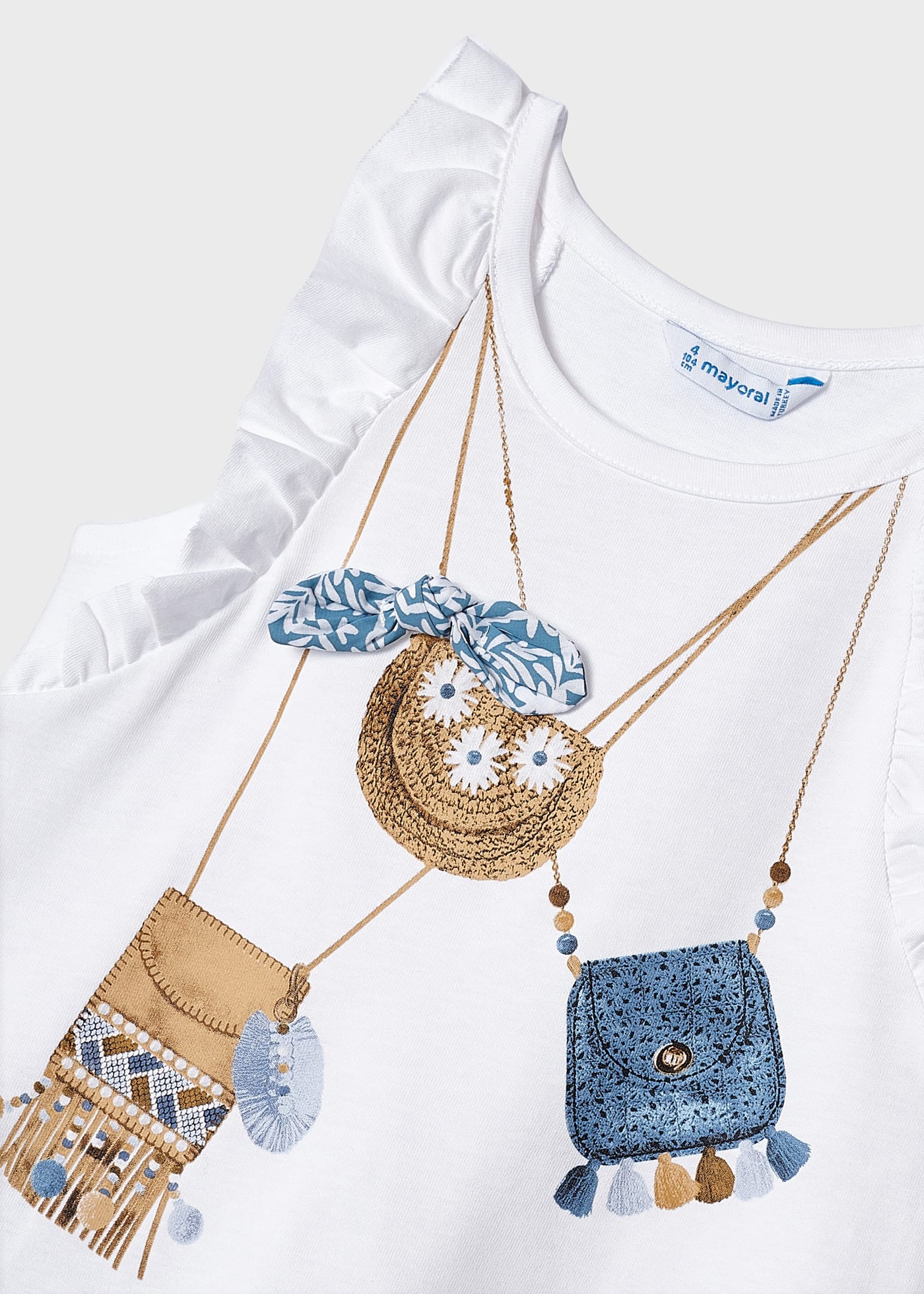 Camiseta regata feminina com babados, feita de algodão sustentável.