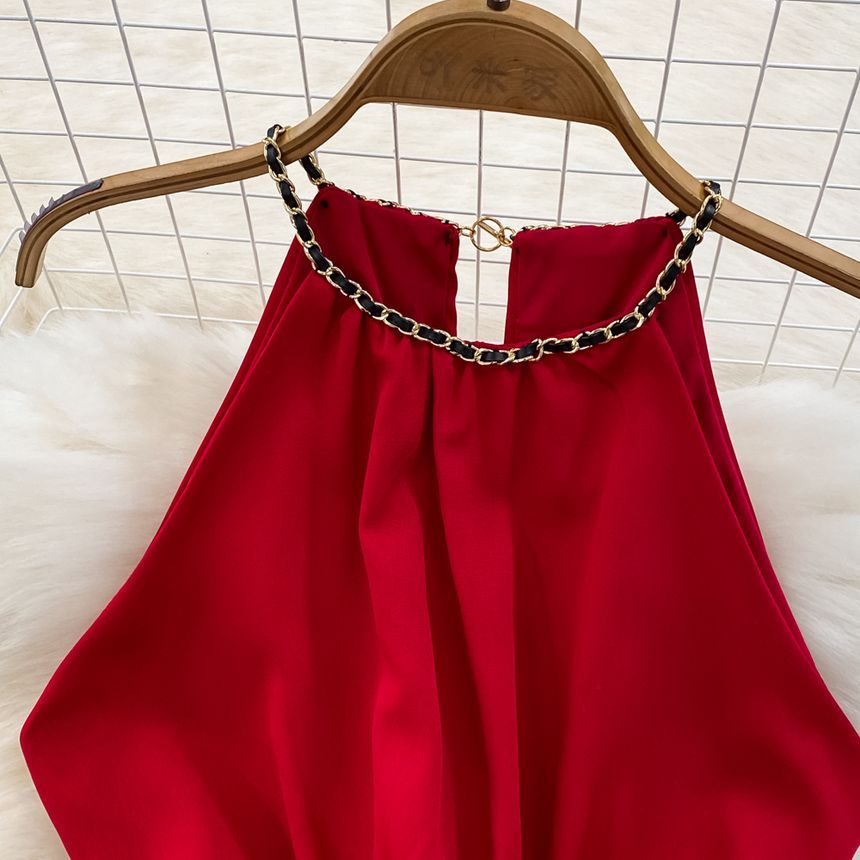 Yearnin - Mouwloze halter romper met wijde pijpen