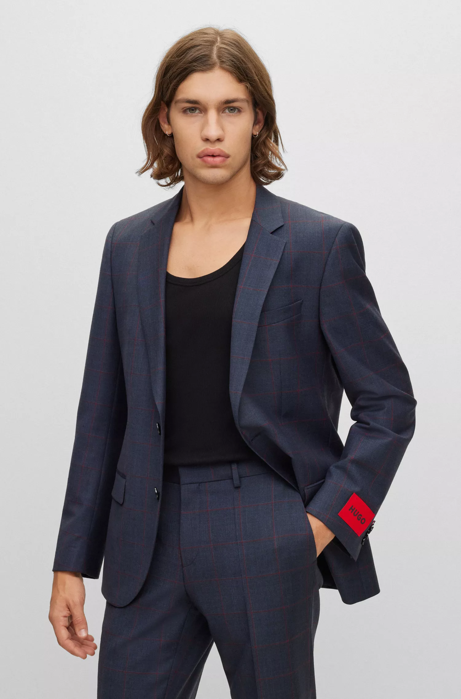 Terno slim fit xadrez vermelho HUGO em mistura de lã elástica.