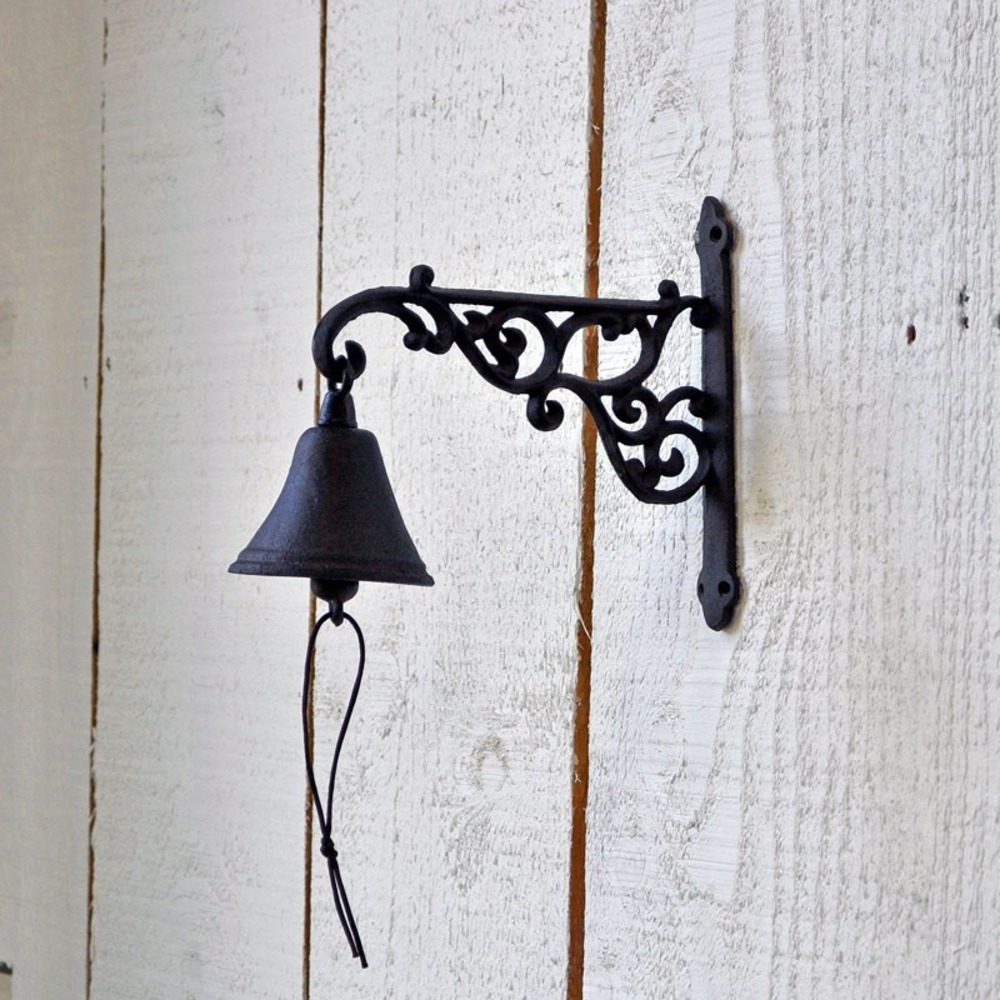 Cloche carillon fonte arabesques 21x24x10cm