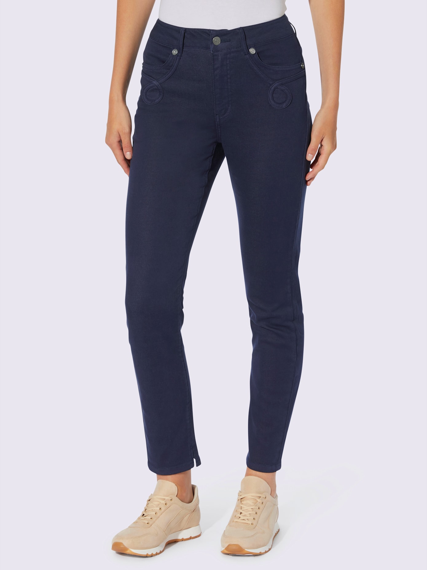 Jean push-up rivets sur les poches