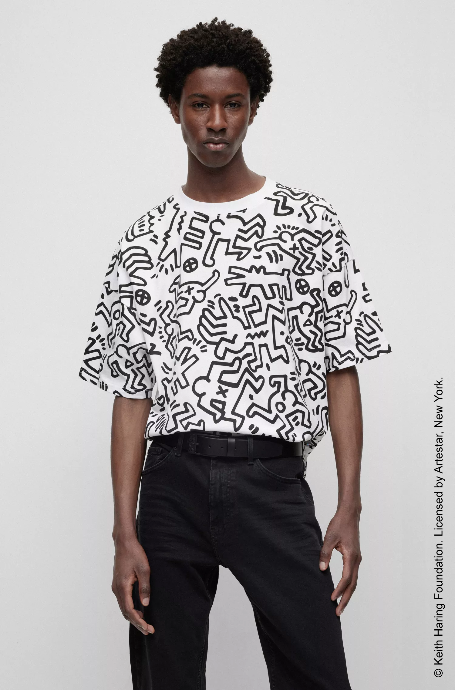 Camiseta preta BOSS x Keith Haring com estampa unissex em malha de algodão.