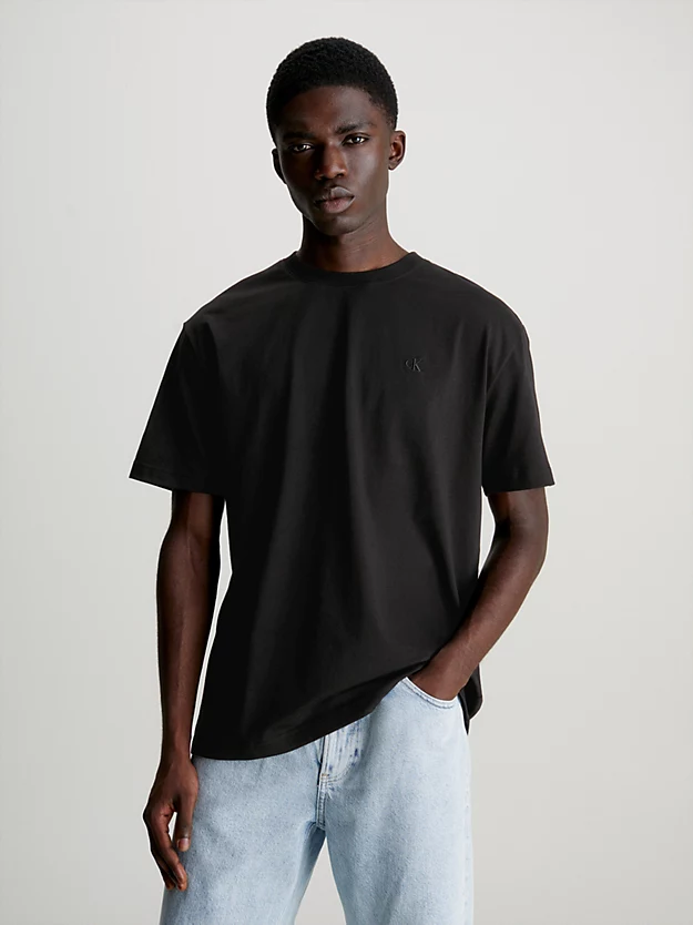 Camiseta de corte folgado com logotipo nas costas