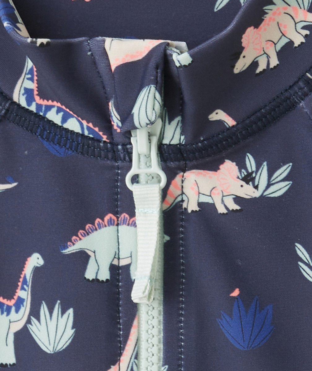 combinaison anti-UV bébé garçon en fibres recyclées bleu imprimé dino