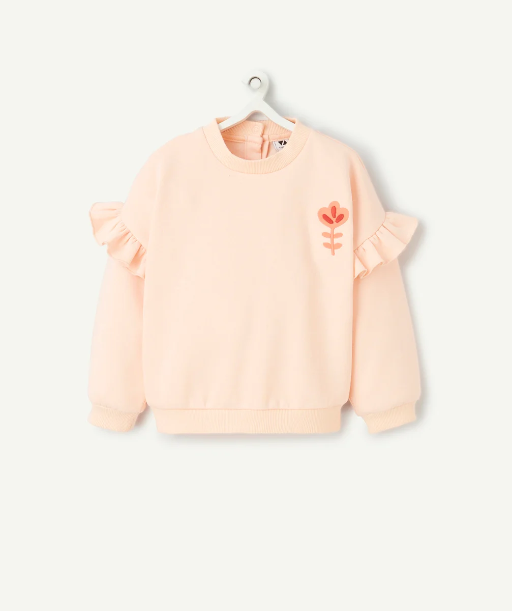 sweat bébé fille en fibres recyclées orange pâle avec volants et fleur brodée