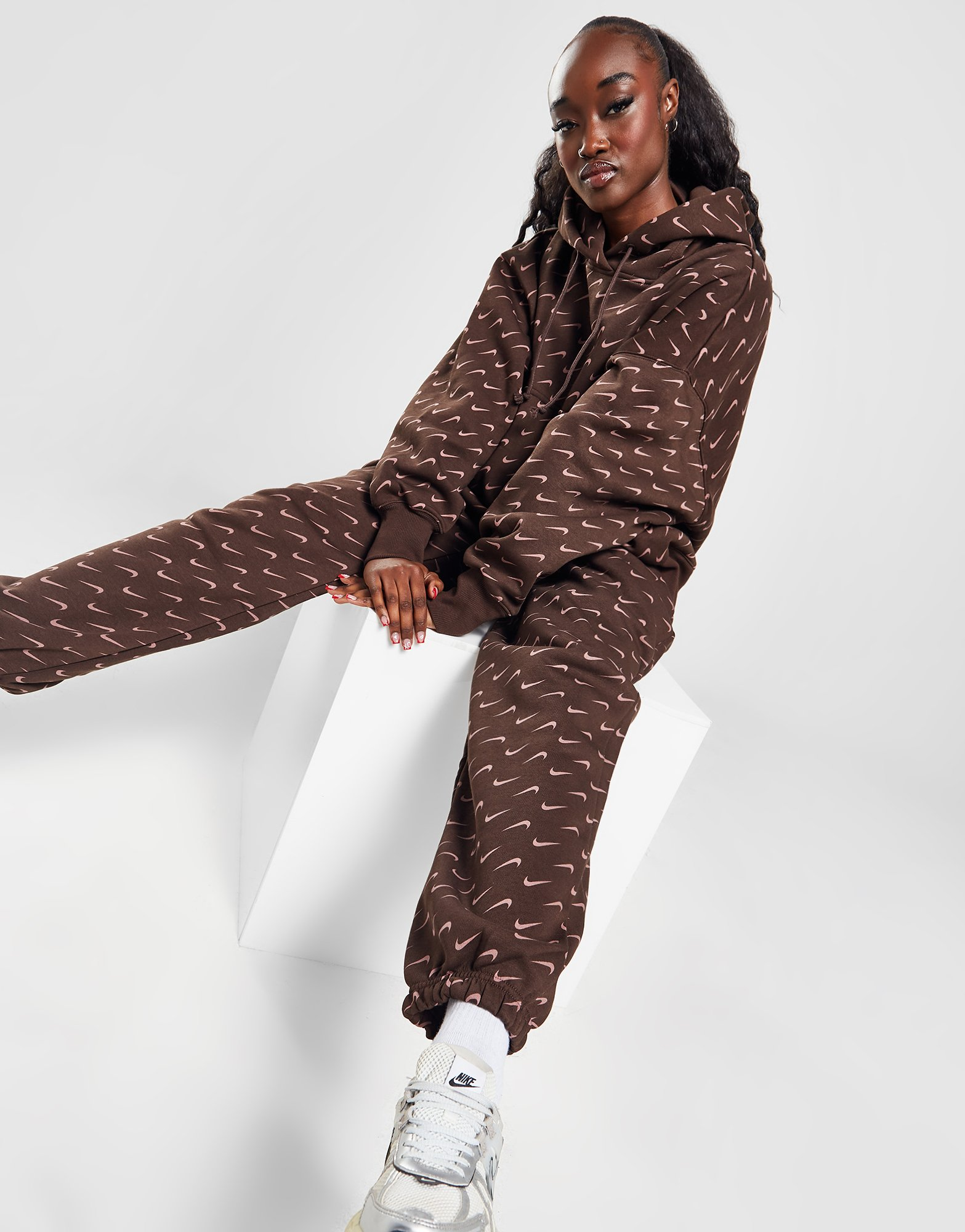 Nike Pantalon de jogging imprimé oversize pour femme Sportswear Phoenix Fleece