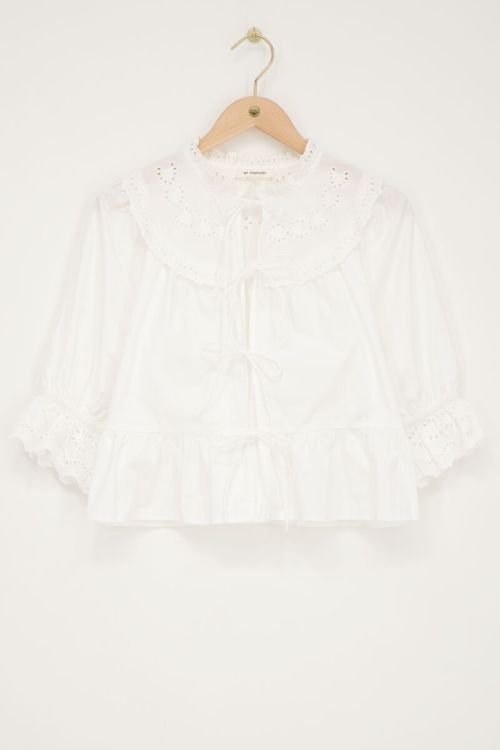 Witte top met strikjes en broderie