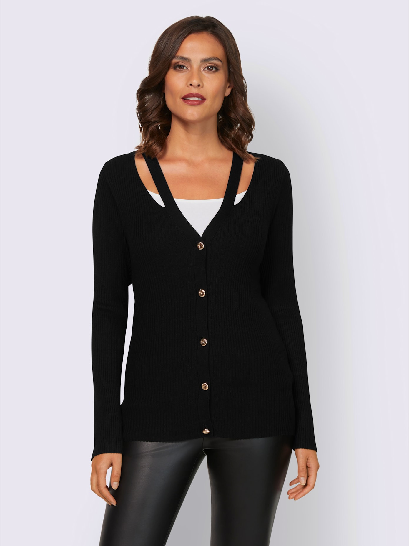 Veste en tricot découpes raffinées