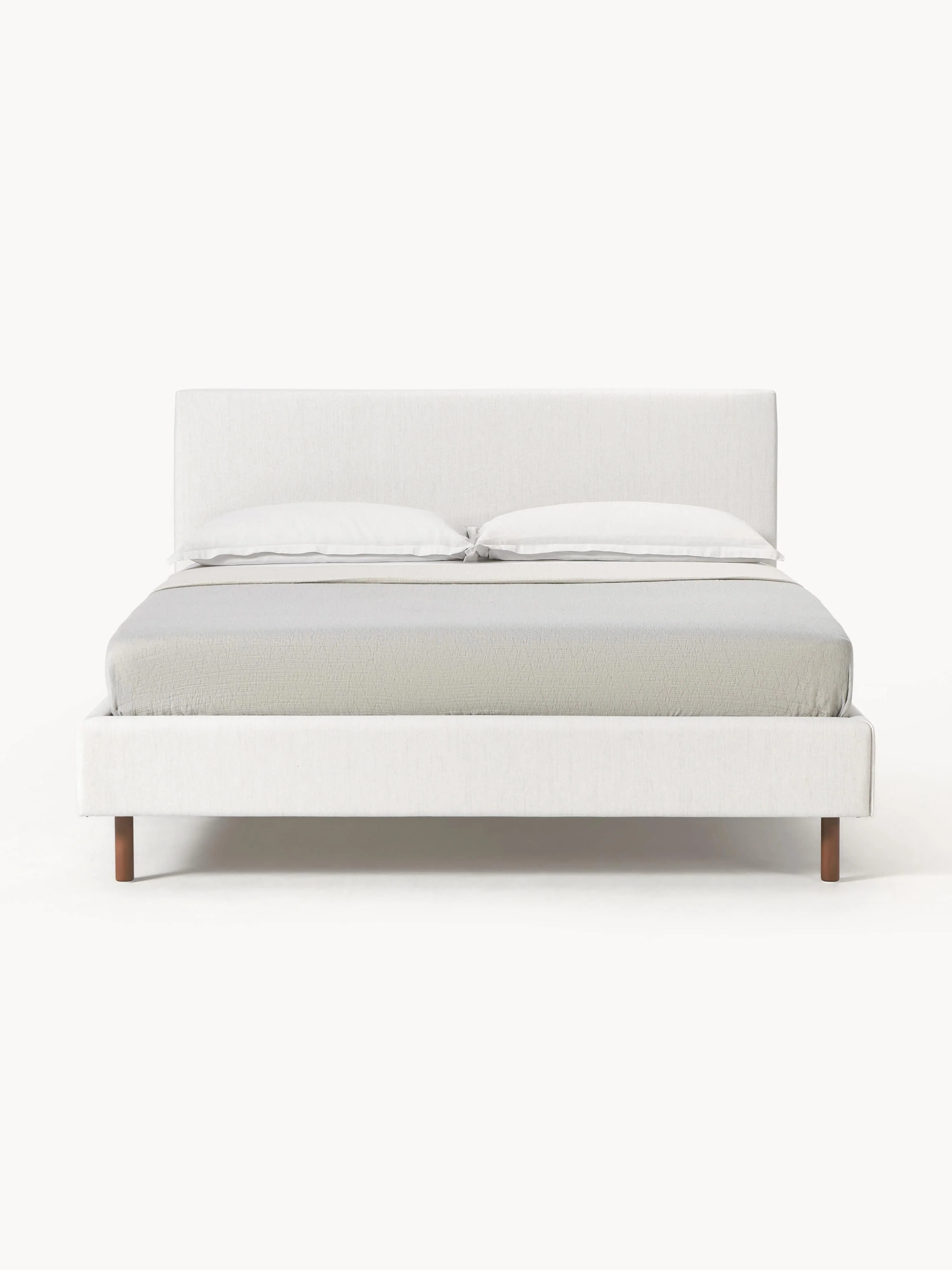 Gestoffeerd bed Giulia met houten poten