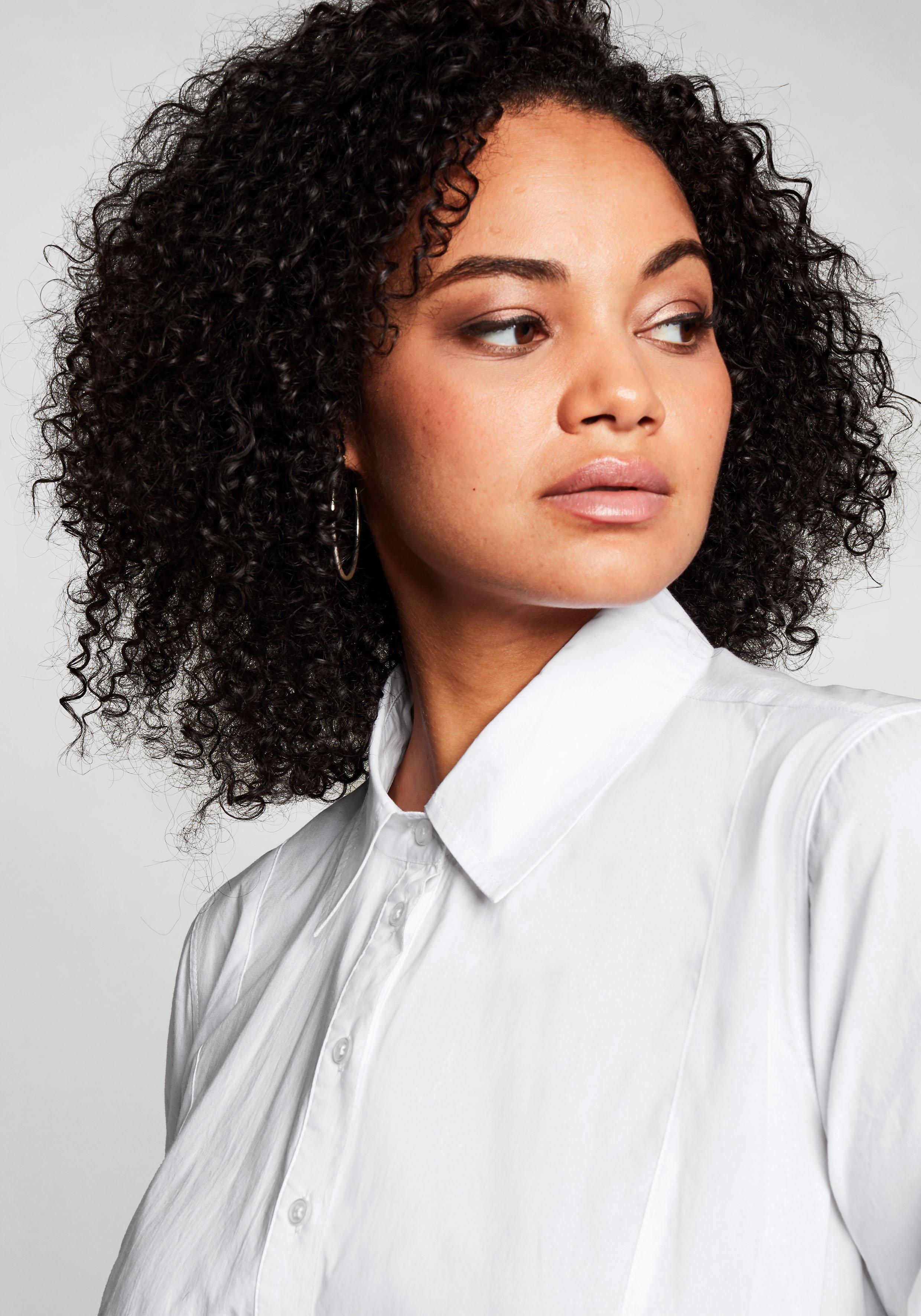 Longbluse mit ausgestelltem Saum