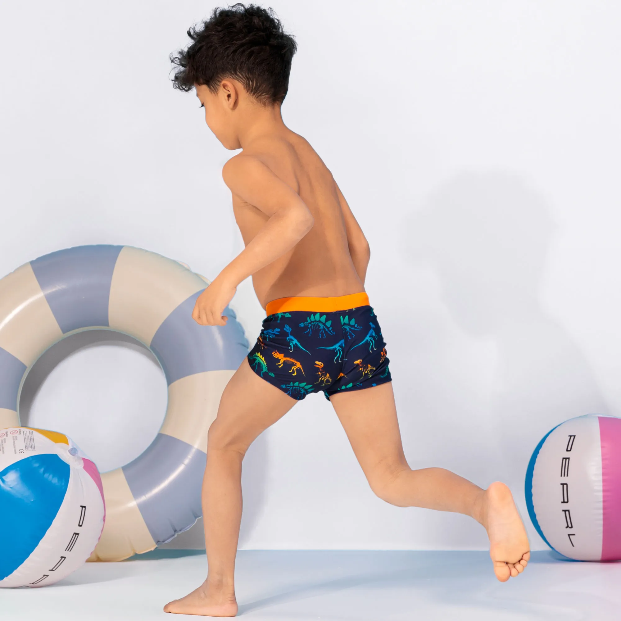 Jungen-Badehose mit Dino-Muster