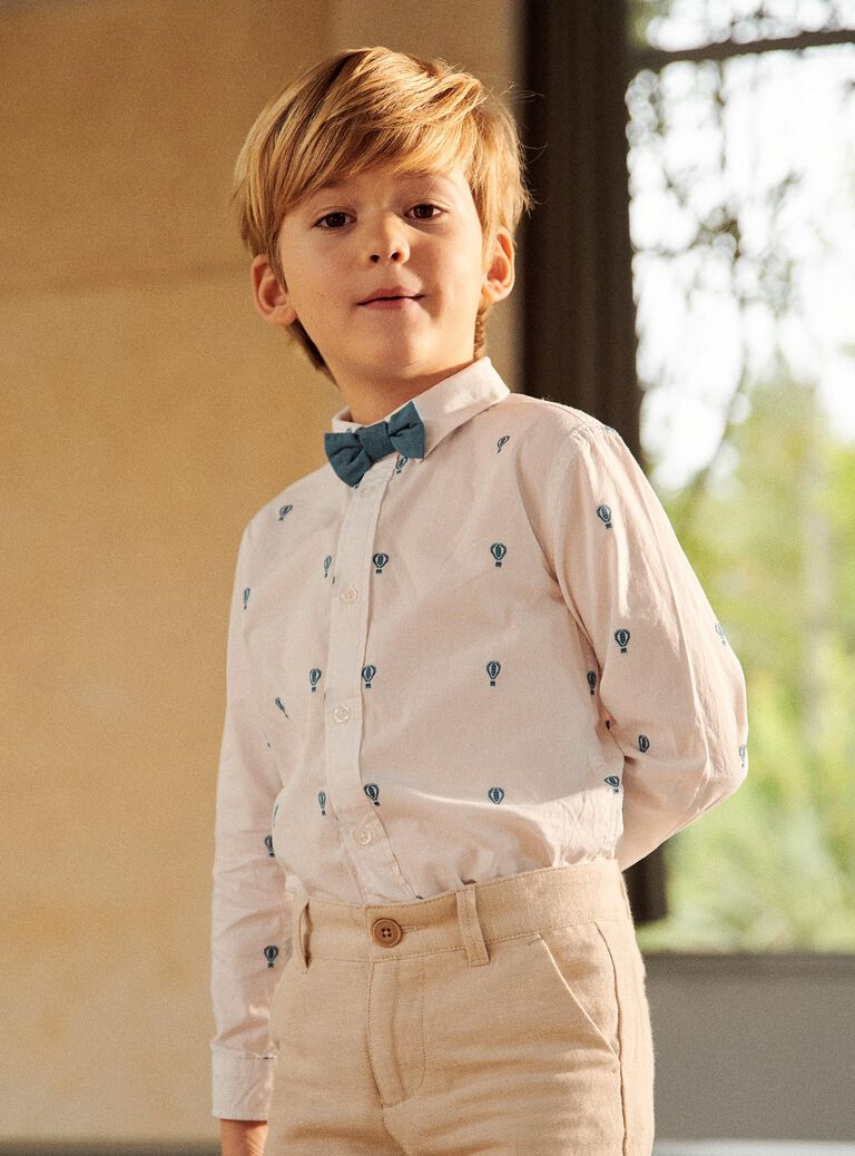 Chemise blanche retroussable avec broderies