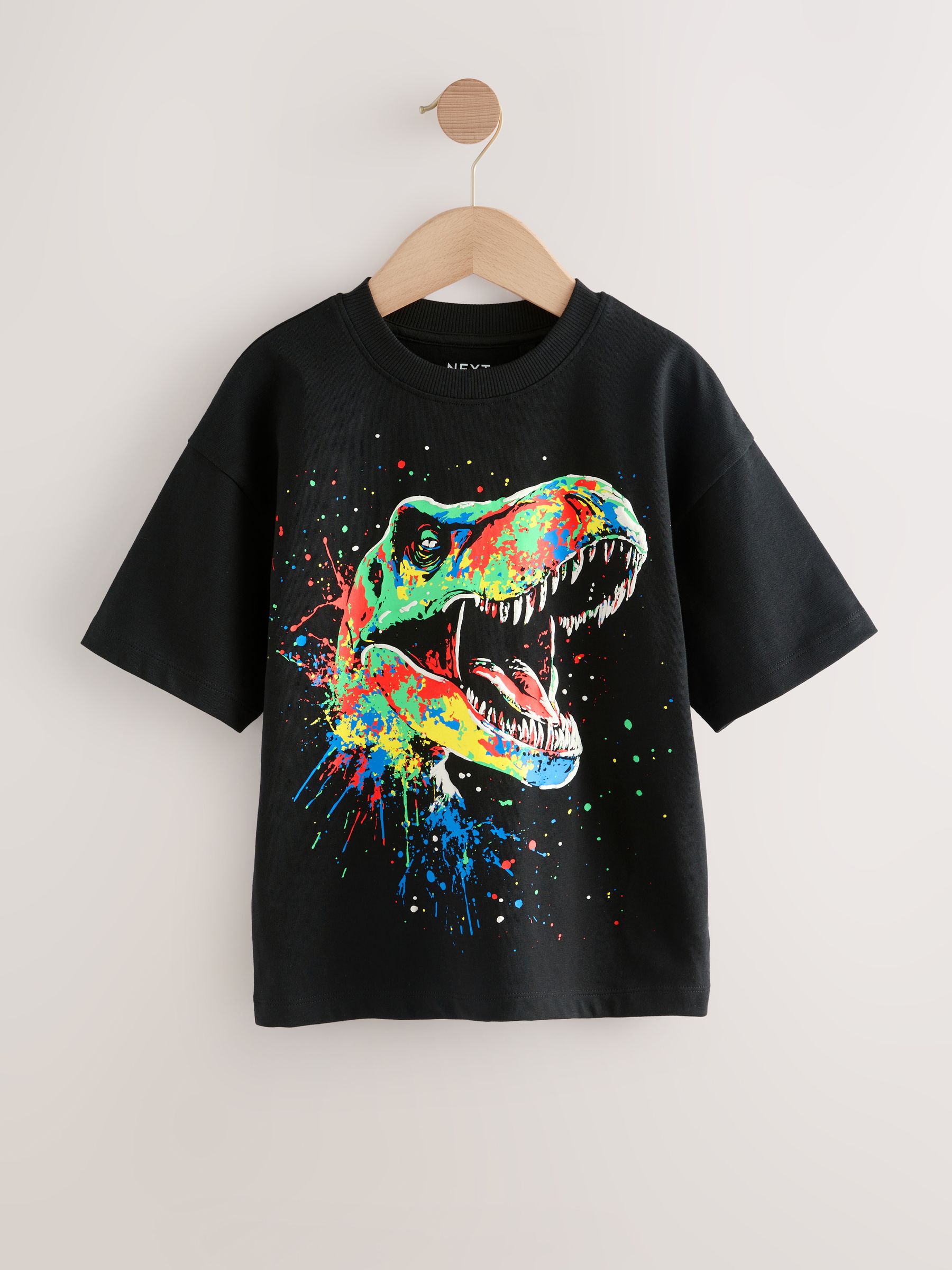 Zwart/Meerkleurig Dino - Ruimvallend T-shirt met print en korte mouwen (3-16 jr)