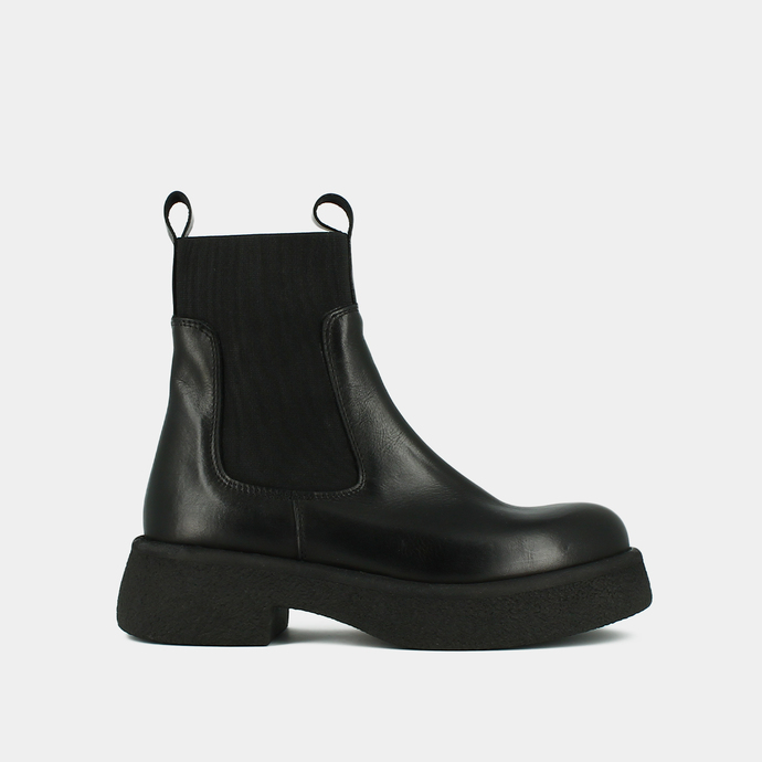 Boots à plateformes, élastiques et bouts...  en cuir noir