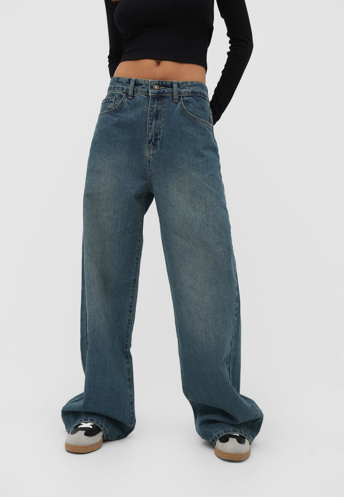calças jeans de perna larga