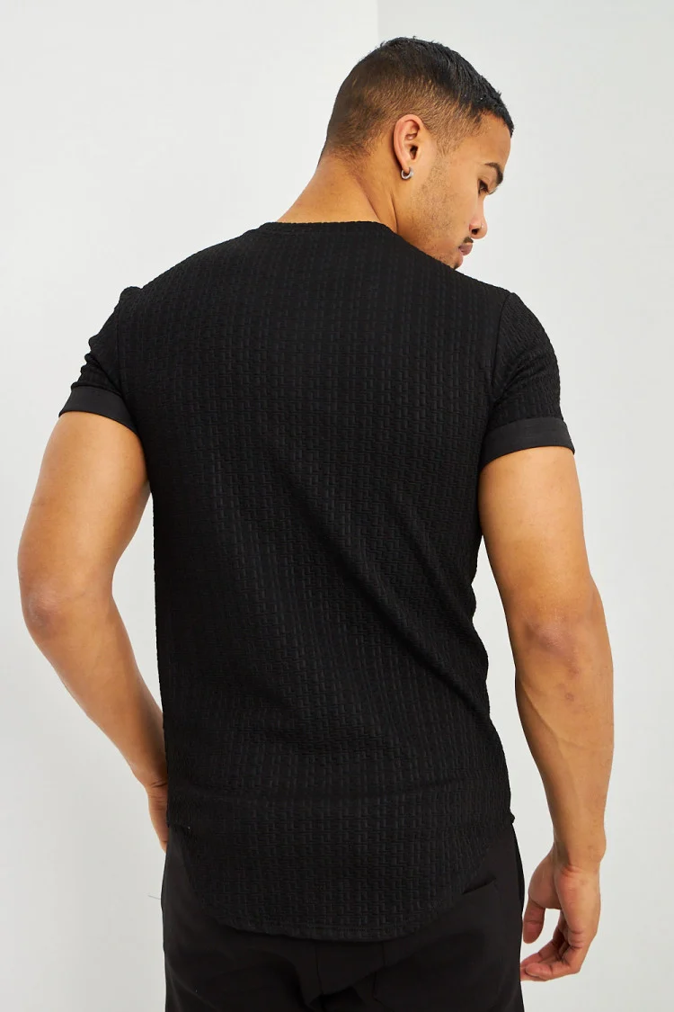 T-shirt motif relief noir manches courtes à revers